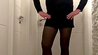 Nicki crossdress black knitted dress, tights and Chelsea boots