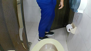 Athletic Girl Pissing in Public Bathroom