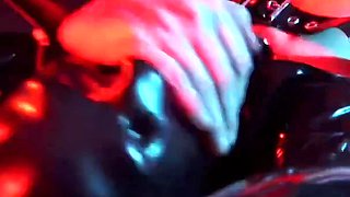 Slave Girl in Latex Catsuit in Electro-shock-heels