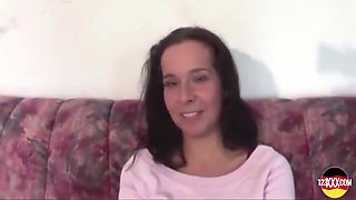A Busty Dark Haired German Babe Getting Filmed While Playing With A Big Dildo