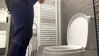 Hot MILF secretly fingers herself with bottle and squirts hard in public toilet