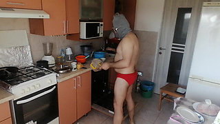 Couple Having Fun in the Kitchen. Sexy Wife Doing Chores in the House Naked