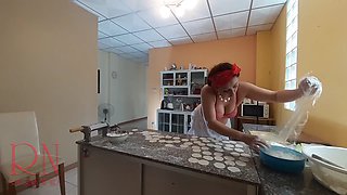 Nudist housekeeper Regina Noir cooking in the kitchen. Naked maid makes meatballs