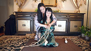 Mistress Mara ties up Marica Hase in shibari and reveals her curves