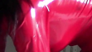 MILF in Red Latex Suit and Patent Leather High Heels Gives a Blowjob with Swallow