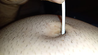 Navel fingering with q tip stick