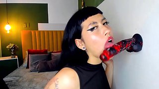 Emo latina sucking a strange dildo