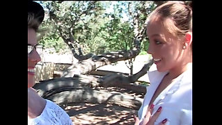 Cute Teen Seduced and Fucked in the Garden with a Strapon by a Busty Lesbian MILF