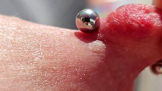 Playing Pierced Nipples Close up on Balcony