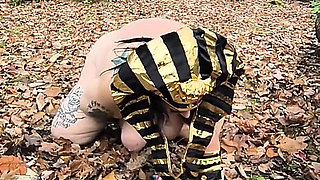 What's This Whore Doing in Those Leaves? on Her Knees?