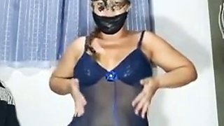 Mirella Delicia is a hot little bitch moving around in a nightgown and blue panties doing a striptease