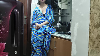 Indian Stepmom Watches and Enters Her Stepson's Kitchen to Fuck Him