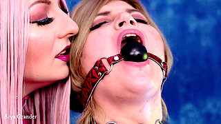 Sensual Gag and Ice Play. Two Hot BDSM Lesbians in Pvc. Fetish Couple Mistress and Girl.