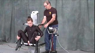 Submissive girl enjoys bondage and BDSM treatment on a machine