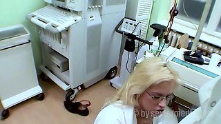 Shaved pussy fucked by gynecologist