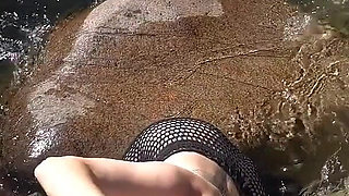 Blowjob and Cumshot on Her Face in a Beautiful River on an Afternoon Walk