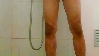 I was taking a shower while masturbating suddenly my man came in and looked at my whole body