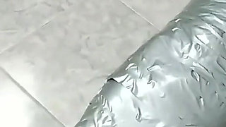 Latino Hunk Heavily Mummified by Cooperative Femdom Women