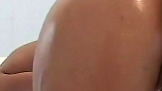 Oiled Pussy Fingered by Lesbian