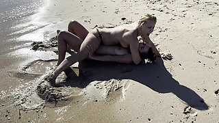Lesbian Couple Fighting for Domination on the Beach