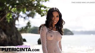 Black teen with round tits Putri Cinta sucks dick on the beach