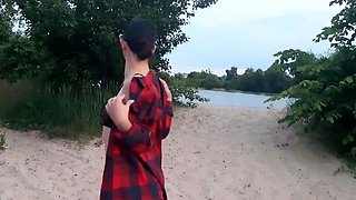 Brunette amateur with small tits shows pussy on public beach