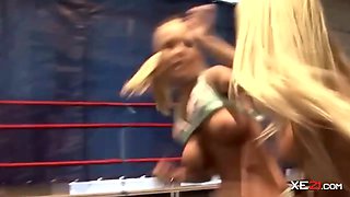 Two busty blondes are wrestling naked