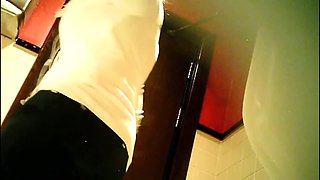 Toilet spy cam records the amateur girl in the scarf
