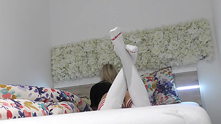 Sexy and Petite Girl with Overknee socks spreading legs to show pussy at home bored ignored
