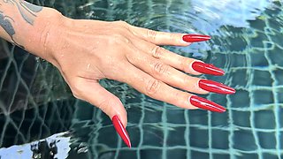 Long Red Nails and Long Fingers in Swimming Pool
