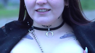 A Beauty with a Tattoo Shows Her Tits