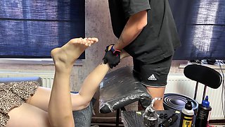 Shy Girl’s First Footjob: Naughty Tattoo Shop Experience
