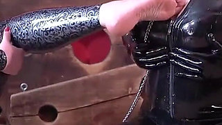 Latex Mistress Verbally Humiliates and Strapons Rubber Sissy Doll. Arya Grander