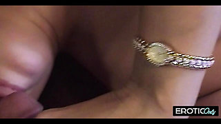Mother and stepdaughter naked on the meadow caressing their breasts