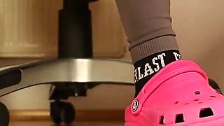 Under Desk Foot Play - Pink Clogs & Worn Socks