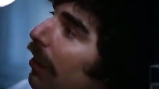 70s porn brunette gives deep blow job to a doctor