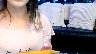 Small titted brunette Sharron with glasses masturbates