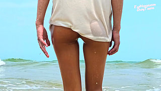 868 Wet Glossy Nude Pantyhose on the Beach