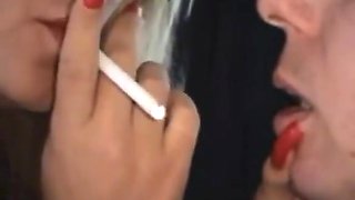 Beautiful smoking, long red nails