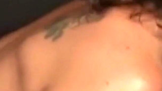 Gucurly Haired Brunette Washes Sins Away with Gloryhole Cum