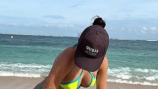 Teasing on the Beach in Micro Bikini on the Sand