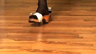 Retro Dangling in Patterned Nylons & Classic Wooden Mules