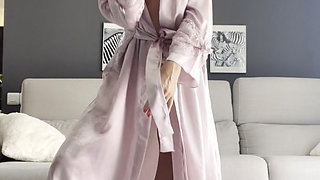 German milf puts on a striptease while her husband is not home