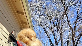 Blonde is flashing her big boobs in the outdoors