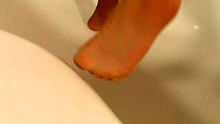 Hot brunette foot fetish play