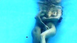 Hot brunette having erotic moist sex in the pool