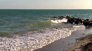 Ashlyn Lee goes fishing, but she would rather enjoy a masturbation session on the sand. She gets caught on-camera by our voyeur videographer.