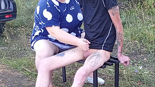 a neighbor in a public park jerks off my dick on a bench