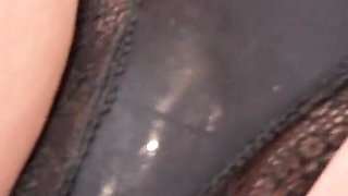 Black lingerie and vibrator on clit