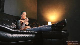 Anette Smokes in Jeans and Boots 4K